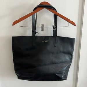 Used Cole Haan black leather tote. Great for work travel!
